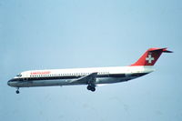 HB-IFV @ EHAM - Swissair Douglas DC-9-32 approaching for landing at Schiphol airport, the Netherlands, 1982 - by Van Propeller