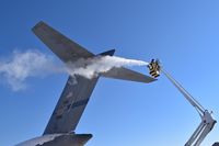 03-3116 @ KBOI - De icing attempt for the tail. 172nd Airlift Wing, MS ANG. Thompson ANGB Field, Jackson, MS. - by Gerald Howard