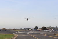 N6050A @ SZP - 2011 Cessna 162 SKYCATCHER, Continental O-200 100 Hp, Light-Sport aircraft, landing Rwy 22. Photo taken from behind the aircraft. - by Doug Robertson