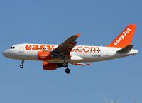 G-EZIX @ LEBL - Landing rwy 25R with only Easyjet.com titles - by Shunn311