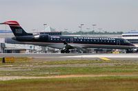 N706PS @ KCLT - US Air Express CL200 arriving in CLT - by FerryPNL