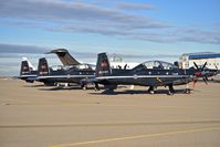 156114 @ KBOI - Three of Seven CT-156 Harvard IIs from No.2 CFFTS, 15 Wing, Moose Jaw, Saskatchewan, Canada parked on the north GA ramp. - by Gerald Howard