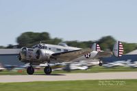 N214CR @ KOSH - Beech AT-11 departing Airventure. - by Eric Olsen