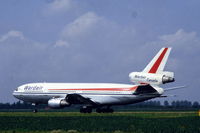 C-GFHX @ EHAM - Wardair Canada DC-10-30 taking off from Schiphol airport, the Netherlands, 1983 - by Van Propeller