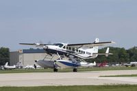 N208WF @ KOSH - Cessna 208 Departing Airventure - by Eric Olsen