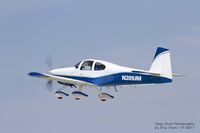 N209JM @ KOSH - RV-10 departing Airventure. - by Eric Olsen