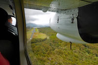 ZK-FWZ @ NZRC - On approach to the airstrip at Ryan's Creek (Stewart Island) - by Micha Lueck