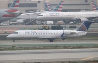 N913SW @ KLAX - CL-600-2B19 - by Mark Pasqualino