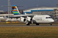 SE-DSP @ EGGW - Braathens Regional RJ100 taxi down runway 06 at London Luton - by dave226688