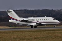 OE-LDN @ EGGW - Mjet Challenger 650 landing on 06 at London Luton - by dave226688