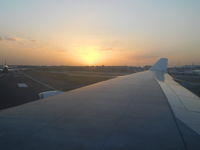 9H-FOX @ YSSY - Taxiing to the runway during sunset, while EY's A380 just arrived, taxiing to the gate. - by Micha Lueck