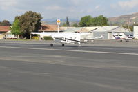 N711JM @ SZP - 1974 Cessna 180J SKYWAGON, Continental O-470 230 Hp, landing roll Rwy 22 - by Doug Robertson