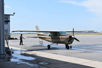 N9510Y @ HRL - Cessna 210 getting washed - by Christian Maurer