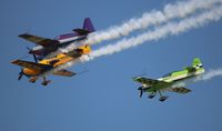 N700XT @ OSH - MX MXS flown by Rob Holland (green aircraft) with Matt Chapman (yellow) and Bill Stein (purple)  - by Florida Metal