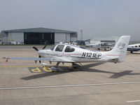 N121EP @ EGJB - On the west parking at Guernsey - by alanh