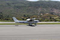 N233ME @ SZP - 2000 Cessna 182S SKYLANE, Continental IO-540-AB1A5 230 Hp, landing roll Rwy 22 - by Doug Robertson
