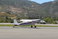 N180BG @ SZP - 1955 Cessna 180, Continental O-470-R 230 Hp, landing roll rwy 22 - by Doug Robertson