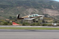 N5883J @ SZP - 1965 Beech S35 BONANZA, Continental IO-520-B 285 Hp, S35 is first 285 Hp BONANZA and stretched for 5/6 seats, takeoff climb Rwy 22. - by Doug Robertson