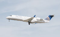 N903EV @ KMRY - United Express CRJ-200ER departing at Monterey Regional Airport. - by Chris Leipelt