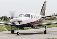 N902TM @ KRHV - Locally-based 2015 Socata TBM-900 taxing to its hangar at Reid Hillview Airport, San Jose, CA. - by Chris Leipelt