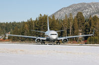 N1TS @ KTVL - 2010 Boeing 737-7JY BBJ landing at South Lake Tahoe Airport, CA. Yes, it's pulling a 180 on the runway to back taxi because we were using the only taxiway at KTVL :) - by Chris Leipelt