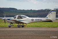 G-BYXL @ EGPN - Taxying to GA parking at Dundee - by Clive Pattle