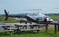 G-BTHY @ EGFH - Visiting Jet Ranger III operated by Suffolk Helicopters Ltd. - by Roger Winser