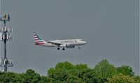 N673AW @ KCLT - Landing for Charlotte - by Floyd Taber