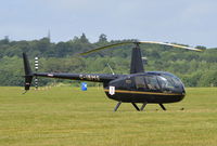 G-IBMS @ EGTB - Robinson R44 Raven II at Wycombe Air Park. - by moxy