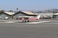 N714HH @ SZP - 1977 Cessna 150M, Continental O-200 100 Hp, landing roll Rwy 22 - by Doug Robertson