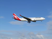 VH-EBK @ NZAA - about to land at AKL - by magnaman