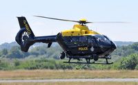 G-NWOI @ EGFH - Visiting EC-135 helicopter operated by the NPAS (Police 12). - by Roger Winser