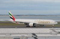 A6-ECF @ NZAA - taxying to gate - by magnaman