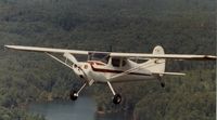 N77061 - N77061 owned and flown by Guy Byars in 1983 over Lake Hartwell near Clemson SC - by William S. Duffey