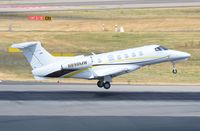 N898MW @ EDDL - Phenom 300 lifting off during departure from DUS - by FerryPNL