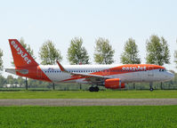 OE-IVM @ AMS - Taxi to runway 36L of Schiphol Airport - by Willem Göebel
