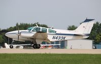 N433K @ KOSH - Beech D55 - by Mark Pasqualino