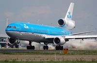 PH-KCH @ EHAM - KLM MD11 thundering down the runway - by FerryPNL