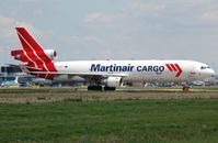 PH-MCY @ EHAM - Martinair MD11F taxying to its stand - by FerryPNL