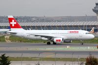 HB-IJJ @ LEMD - Swiss A320 taxying in. - by FerryPNL