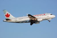 C-FZUG @ CYYZ - Air Canada A319 now flies for AC Rouge. - by FerryPNL