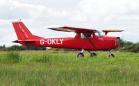 G-OKLY @ EGFH - Visiting Reims Cessna F150K. - by Roger Winser
