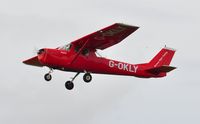 G-OKLY @ EGFH - Visiting Reims Cessna F150K departing Runway 22. - by Roger Winser