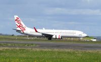 VH-YIH @ NZAA - Landing at AKL - by magnaman