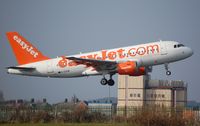 G-EZSM @ EGGP - Easyjet A319 taking-off from LPL - by FerryPNL