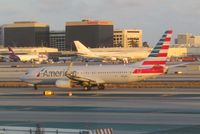 N986NN @ LAX - taxying out in twilight - by magnaman