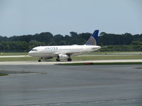 N492UA @ MKE - taxying to ggate - by magnaman