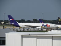 N733FD @ MKE - viewed from car park at MKE - by magnaman