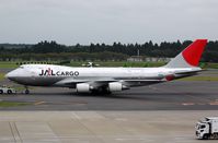 JA401J @ RJAA - JAL b744F under tow - by FerryPNL