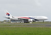 9M-MTU @ NZAA - landing at AKL - by magnaman